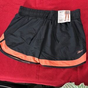 Reebok Women's Black and Orange Athletic Shorts